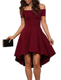 Side angle showing the high-low swallowtail hemline on a purple dress