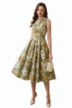 Back view showing the sleeveless cut and high-waisted structure of a vintage midi dress