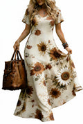 Front view of a woman wearing a cream sunflower floral V-neck maxi dress