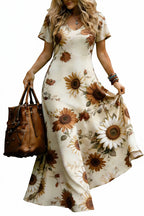 Front view of a woman wearing a cream sunflower floral V-neck maxi dress