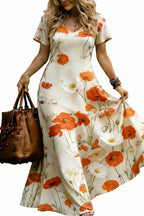 Outdoor lifestyle photo of a model in a bohemian sunflower floral sundress