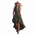 Front view of a woman wearing a green vintage lapel zipper ruffle hem maxi dress